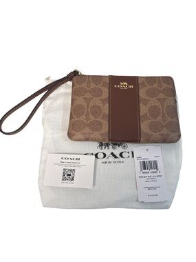 COACH NWT Brown and TanSignature Canvas Wristlet W/ Dusty